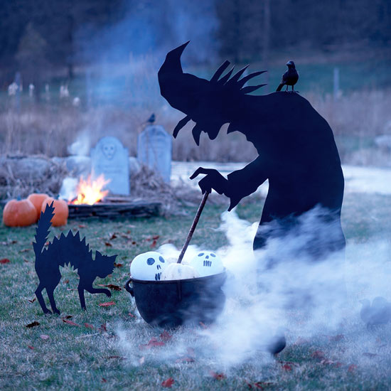 Life-size witch silhouette, wickedly stirring a concoction in a large pot would definitely look creepy on any front yard.