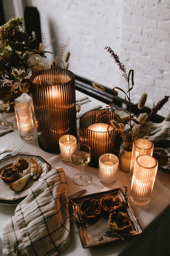 dried blooms, herbs and leaves and lots of candles for an intimate Thanksgiving dinner