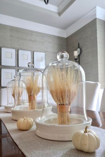 wheat bundles and white pumpkins are amazing for creating chic rustic decor for Thanksgiving and fall
