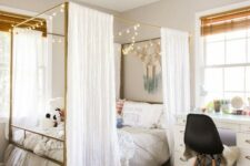 a cool teen room with a large canopy bed with lights, a white desk, a black chair and shades is a pretty space