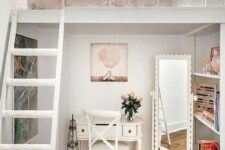 a creative Parisian teen bedroom with a loft bedroom, a tiny desk and a chair, a floor mirror and built-in shelves