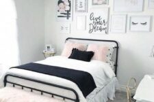 a girlish teen bedroom in black, white and blush, with a cool gallery wall, printed textiles and touches of brass