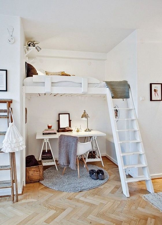 a light-filled contemporary teen bedroom with a working space below and a sleeping one above