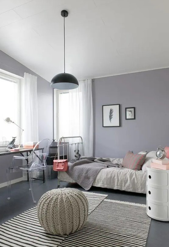 a modern grey and lilac teen girl bedroom with eclectic furniture, neutral textiles and a pendant lamp