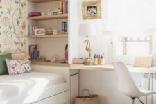 an airy teen girl bedroom with flroal wallpaper, a crystal chandelier, hot pink and gold touches is lovely