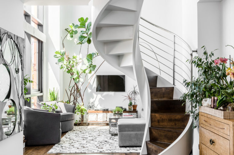 A spiral staircase could be placed in a middle of a room and it won't occupy much space. (James Wagman Architect, LLC)