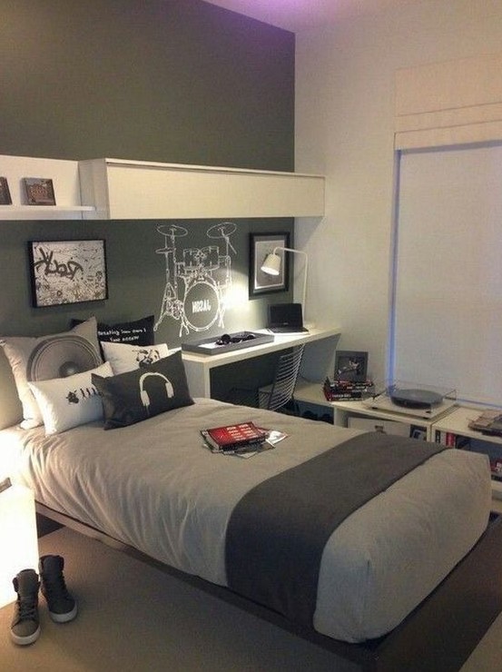 a contemporary teenage bedroom with grey and white walls, white furniture and a single floating bed plus lights
