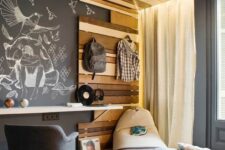 a teenager’s room with a chalkboard wall
