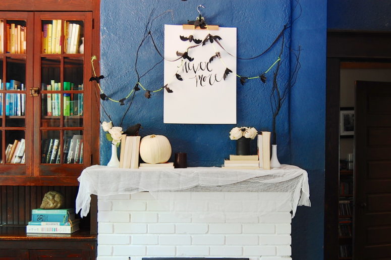 A bat garland isn't that hard to DIY. You just need to print their silhouettes and cut them from black cardboard or duct tape.