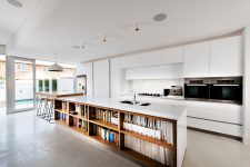 modern kitchen island could provide enough storage space for cookbooks and food magazines