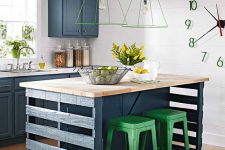 you can build a kitchen island from wood pallets and a butchter coutertop