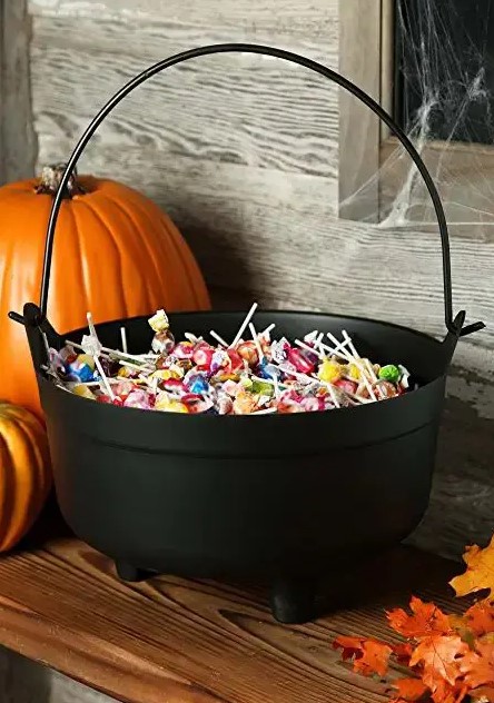 a cauldron with sweets and candies is a perfect solution for Halloween, it can be placed on the porch to treat all guests