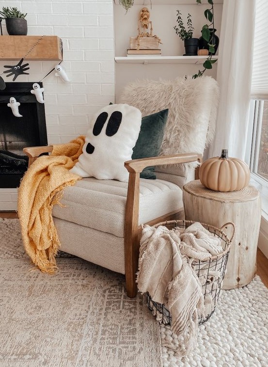 a ghost garland and a ghost pillow for cute and fun Halloween decor are a nice decor you can DIY