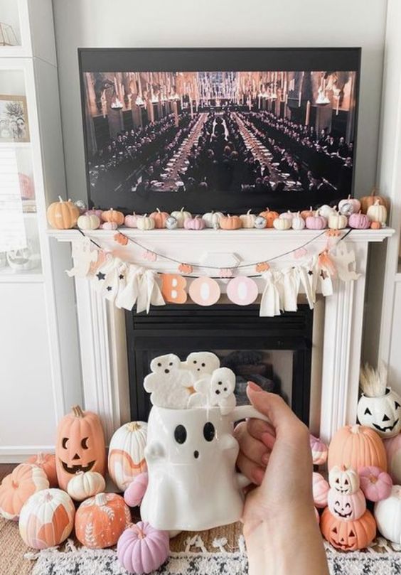 pastel pumpkins, a letter banner and some ghosts will easily fit both a kids' and an adults' party
