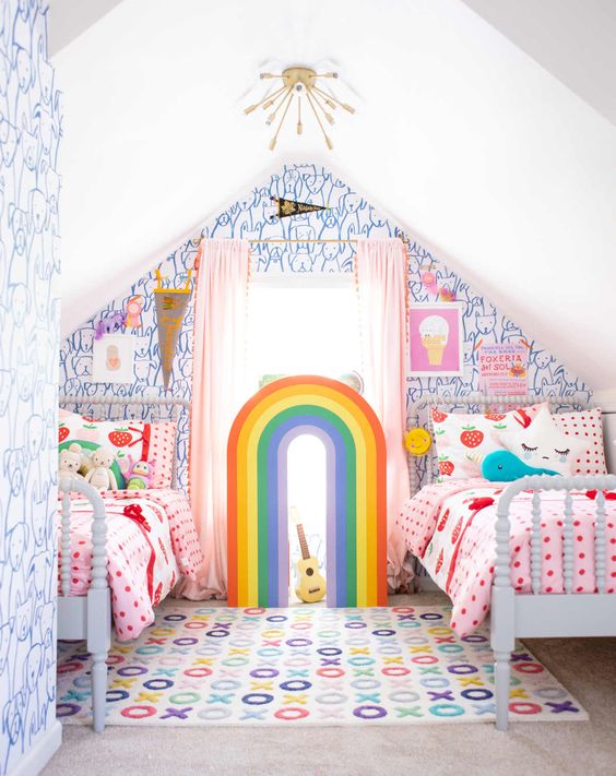a unique and extra bold attic shared kids' room with catchy bear wallpaper, beds wiht pink bedding and various pillows, a bold rug