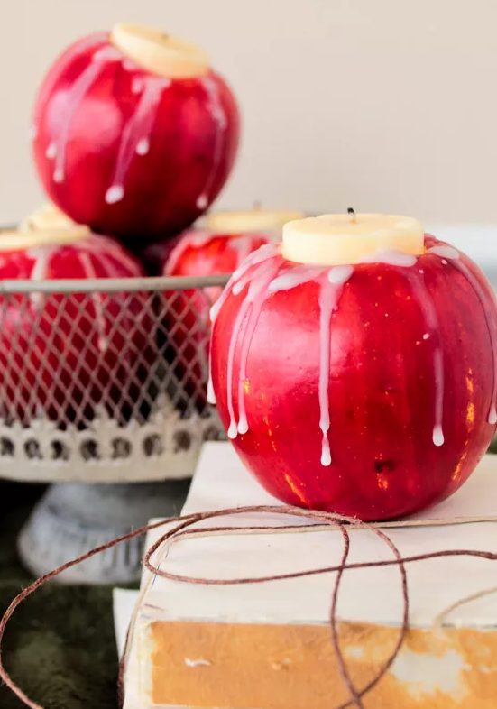 apples turned into candleholders is a super natural and very fall-inspired idea for Thanksgiving or just for the fall