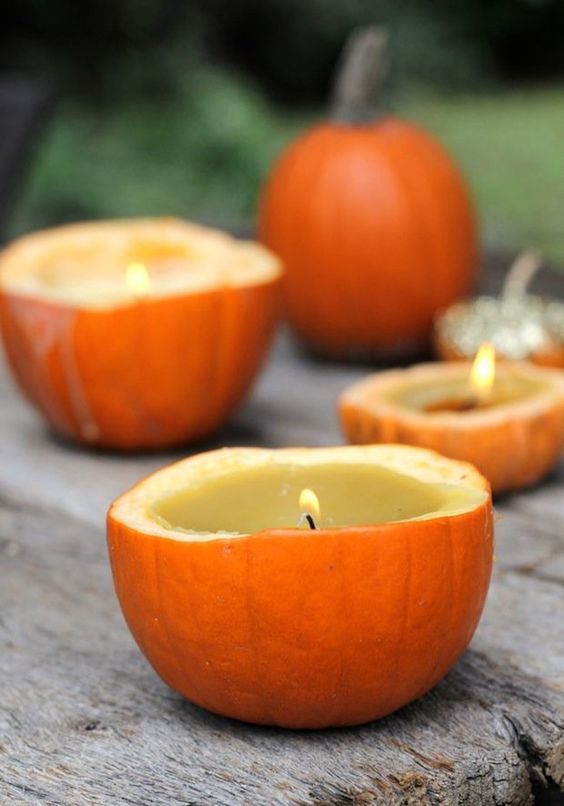 cinnamon scented pumpkin candles are perfect for Thanksgiving and they are super natural as decor