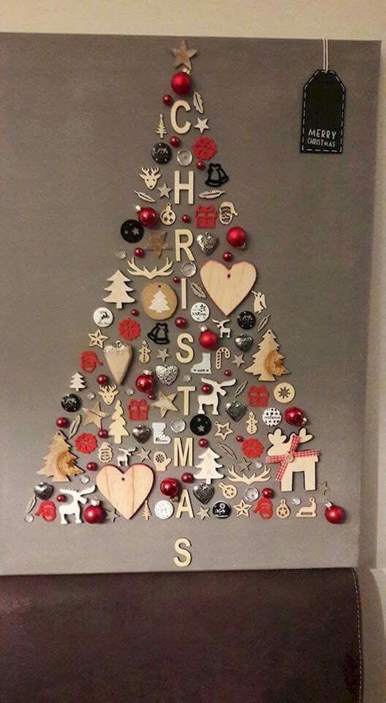 a Christmas tree wall art composed of wooden and usual ornaments, letters and beads is an awesome decoraiton for a modern space