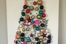 a Christmas tree wall art made of bright vintage ornaments is always a good idea and a very refined decoration