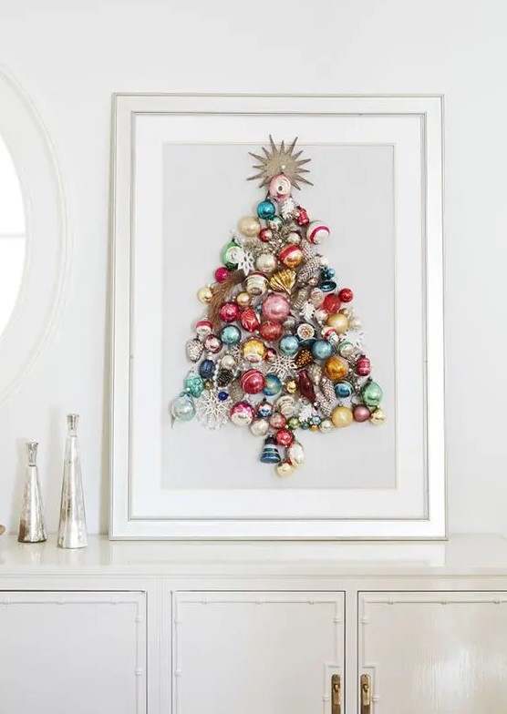 a beautiful colorful Christmas tree made of ornaments on a sign is a chic idea of an additional Christmas tree