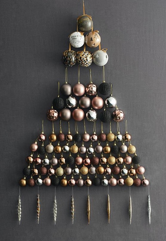 a unique ornament Christmas tree in silver, gold, pink and black is a lovely idea if you don't have a tree itself