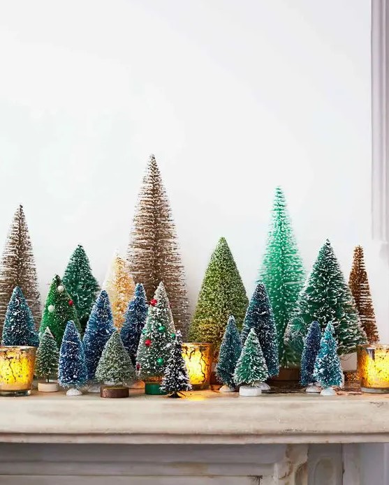 a vintage mantel with colorful bottle brush Christmas trees with bright beads as ornaments and candleholders