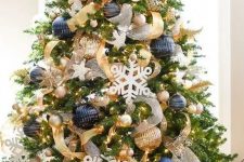 a gorgeous christmas tree with oversized ornaments