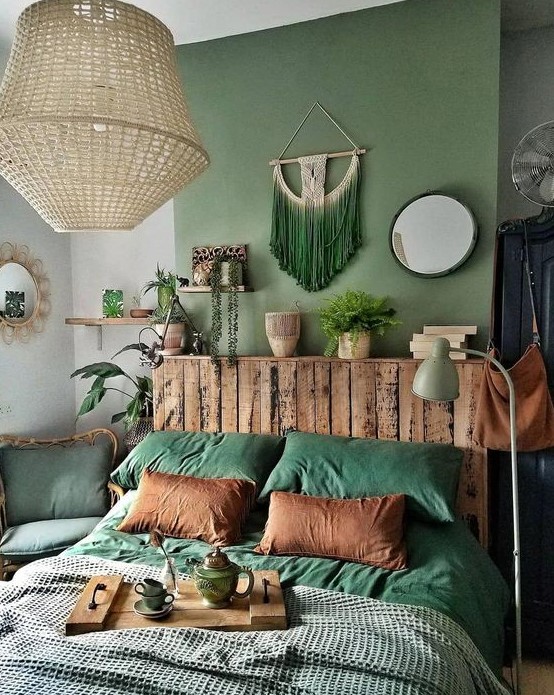 a bright fall boho bedroom done in the shades of grey, rust and stained wood looks amazing