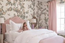 a girl’s room with a botanical wallpaper