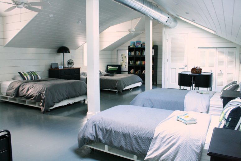 an attic bedroom for four boys design in shades of gray