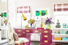 a colorful home office in neutrals, with a hot pink desk, a bold rug, touches of turquoise and striped curtains