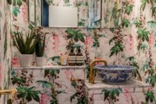 floral wallpaper is a gorgeous idea for a small powder room