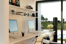 a contemporary shared home office nook by a glazed wall, with a floating desk, white chairs, open shelves and a lovely view