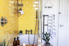 a cute bright yellow bathroom design