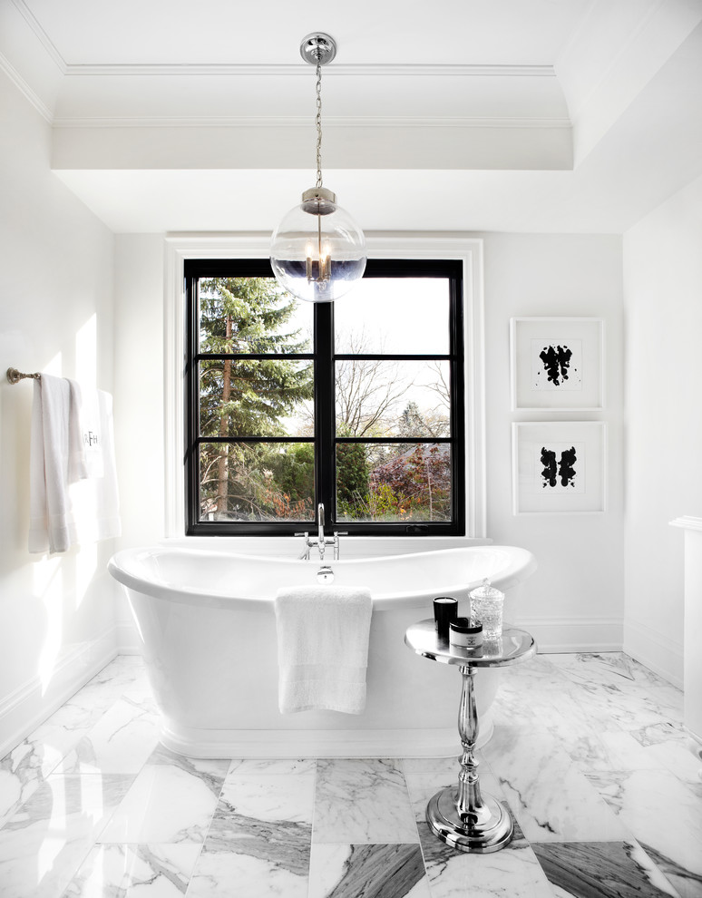fresstanding tub on a marbel floor is always a sing of luxury