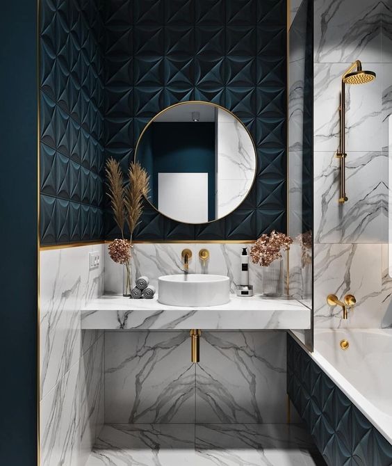 grey marble and teal geometric tles, gold elements and a round mirror for a luxurious and glam bathroom