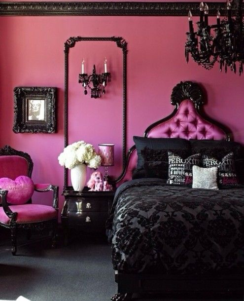 a girlish Gothic bedroom with pink walls and furniture, black touches from drama   a black chandelier, bedding and frames