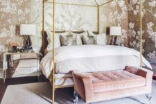 a romantic glam bedroom with botanical print walls, a glam gold bed, a pink bench, mirror nightstands
