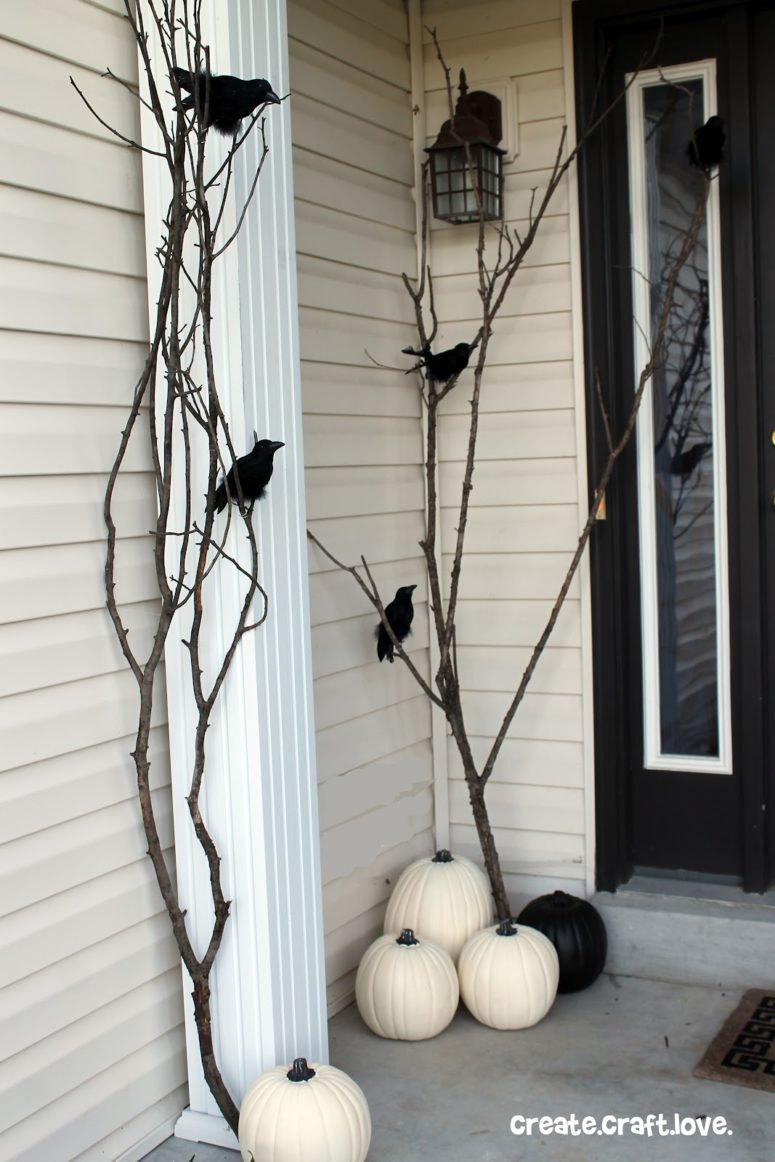 If your porch is painted in white then black ravens, tree branches painted in black and b&w pumpkins would looks gorgeous on it.