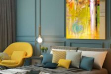 a colorful fall bedroom with a bright artwork, a yellow chair and pillow and lots of teal