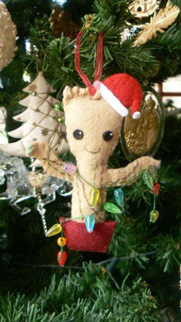 a baby Groot Christmas ornament of various felt, with colorful beads is a fun and lovely idea to rock