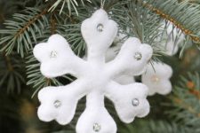 a white felt Christmas snowflake ornaments with sequins is a very lovely idea to rock in winter