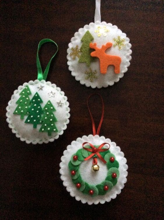 colorful felt Christmas ornaments with a wreath, trees and deer plus beads and bells is a bold and fun idea to realize
