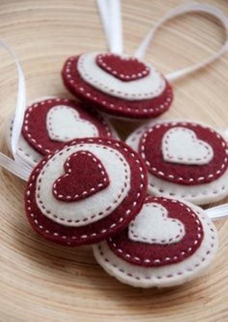 red and white Christmas felt ornaments with hearts are lovely and bright and will bring in some color to the tree