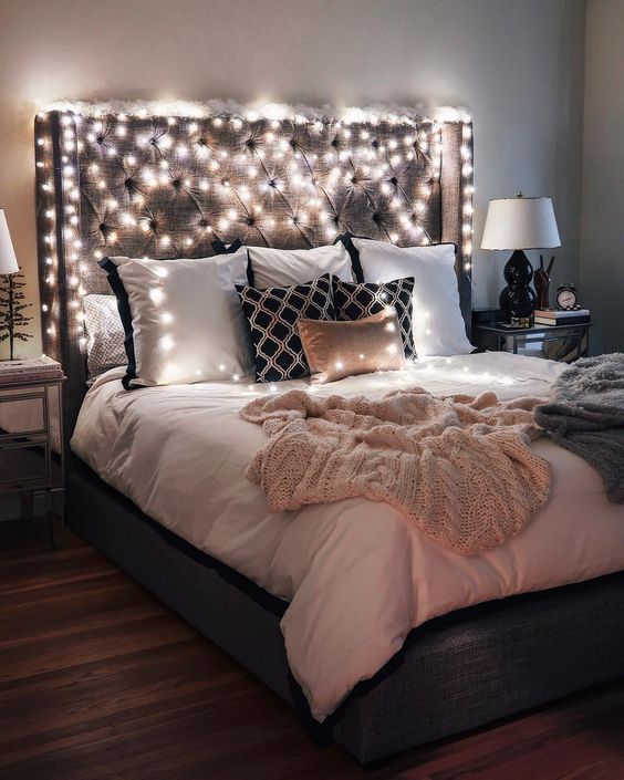 lights covering the headboard is a very cool and simple idea to brign much light into your bedroom