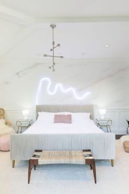neon lighting over the bed is a cool and modern idea to light up the space
