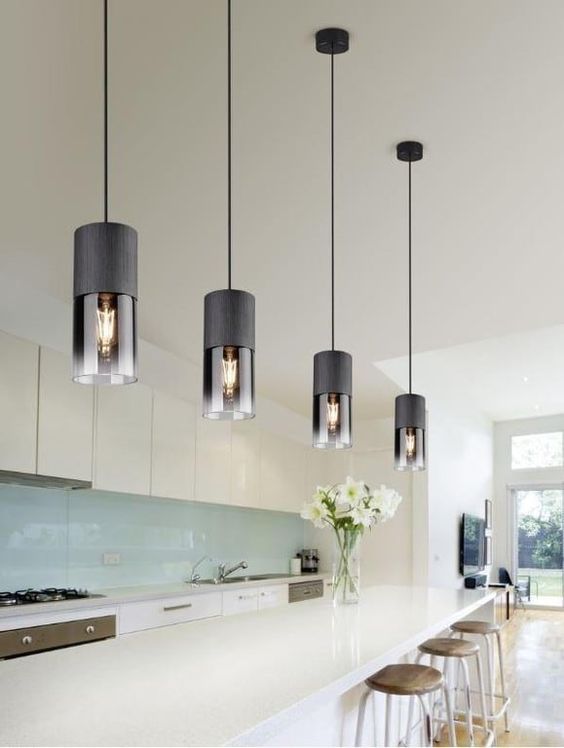 ultra-modern black pendant lamps with smoked glass will give your space an edgy feel and will make it wow