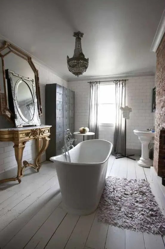 a lovely bathroom with a free standing bathtub