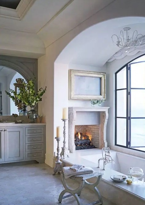 a vintage fireplace in the bathroom will give it a relaxing feel and will turn it into a spa