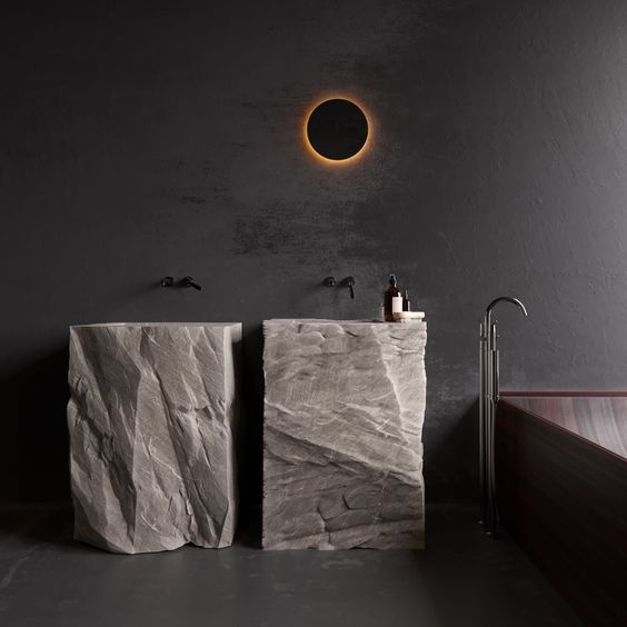 two free standing sinks cut out of rough stone looks extremely spectacular and super bold two free-standing sinks cut out of rough stone looks extremely spectacular and super bold